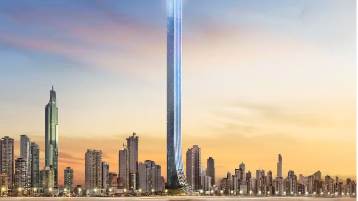Imagem do Senna Tower, o maior prédio do mundo no Brasil, localizado em Balneário Camboriú. O arranha-céu destaca-se no skyline da cidade ao pôr do sol, com sua estrutura moderna e imponente.