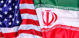 Negociações entre Irã e EUA sobre o programa nuclear iraniano em Omã, com implicações para a geopolítica e o mercado de petróleo.