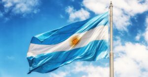 A imagem mostra a bandeira da Argentina para representar que a economia argentina cresce abaixo do esperado