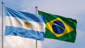 Bandeiras da Argentina e do Brasil lado a lado, representando o comparativo do PIB da Argentina no 1º tri de 2025.