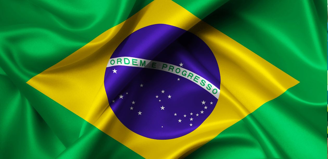 Bandeira do Brasil com cores verde, amarelo e azul, representando o país